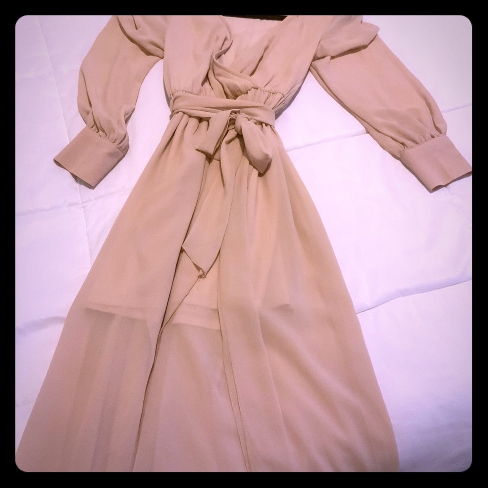 Women’s long sleeve open dress with a short skirt